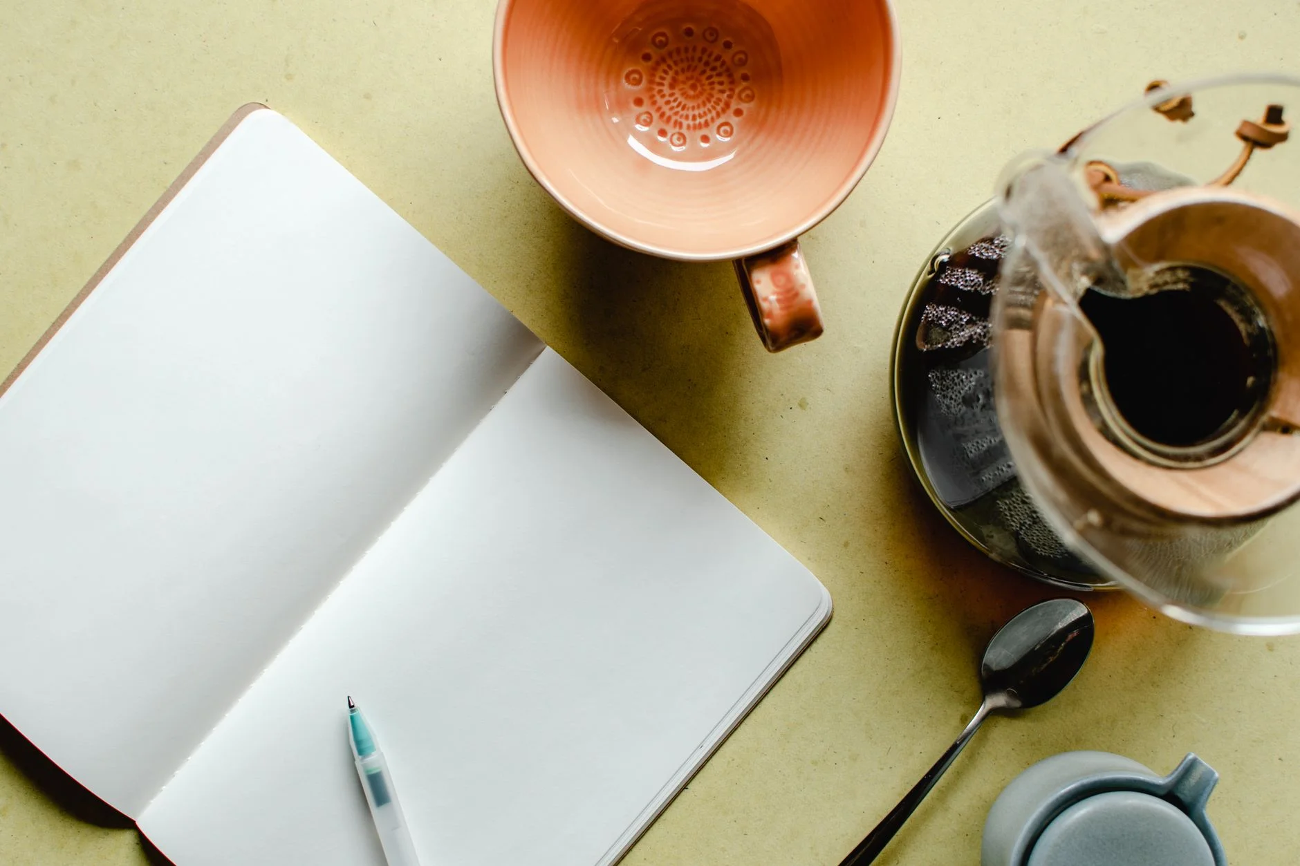 Ceramic and linen travel objects in an editorial arrangement