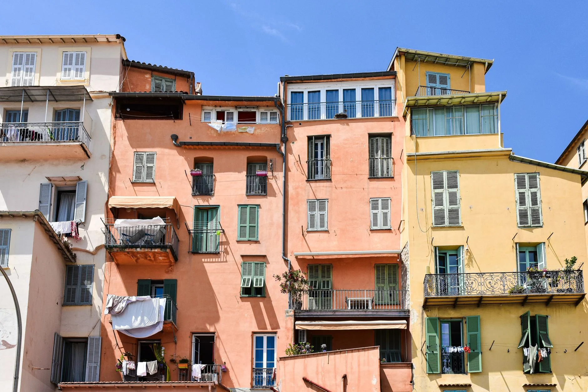 Pastel facades in the old town of Menton on the French Riviera