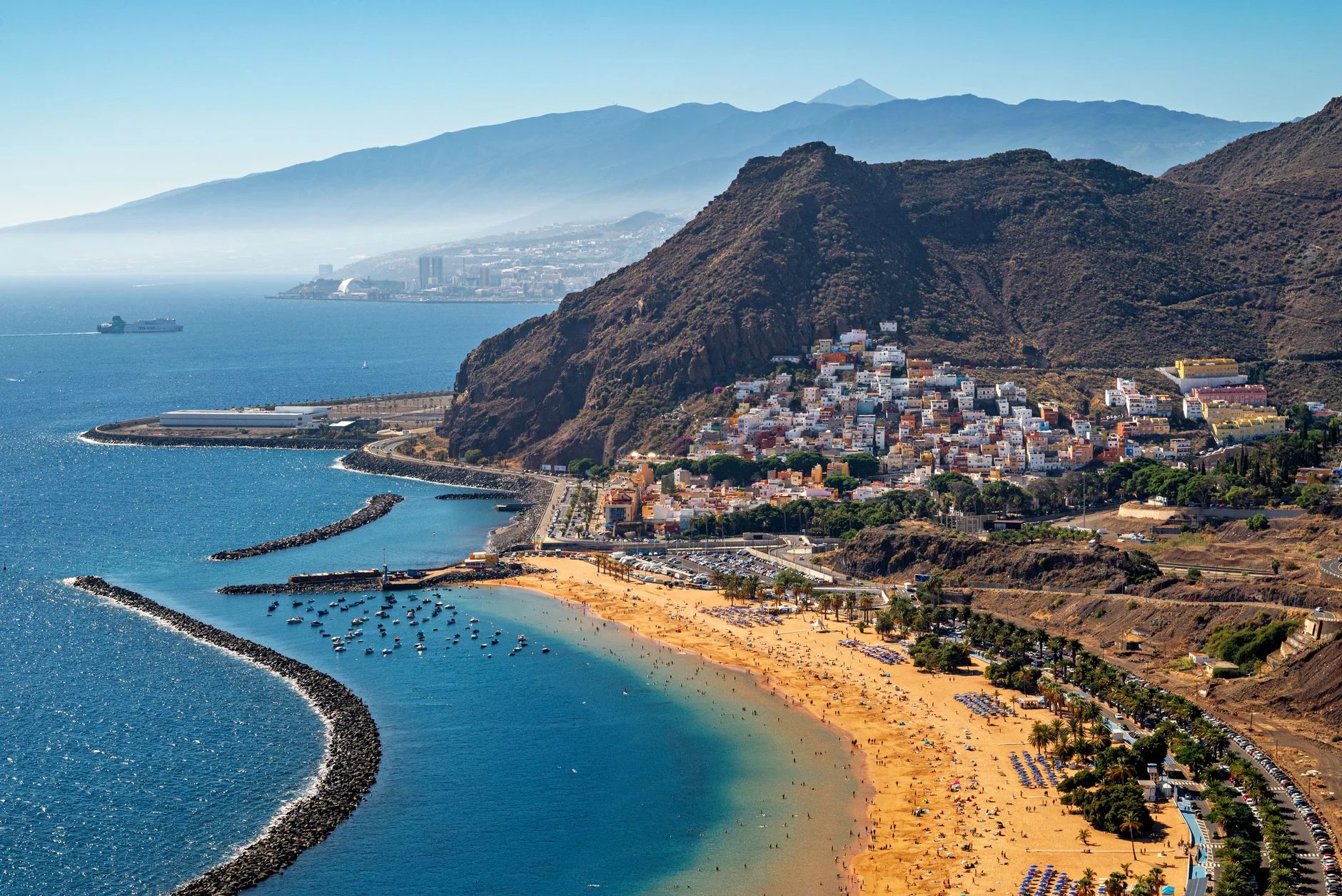 A golden Canary Islands beach in bright sunshine