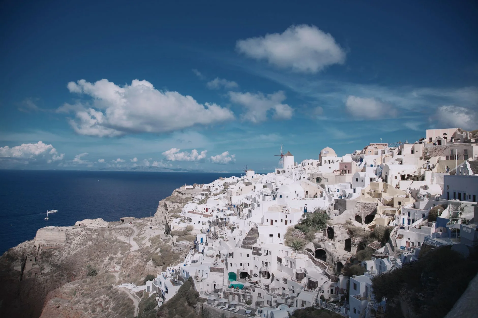 White Cycladic houses above the caldera in Santorini