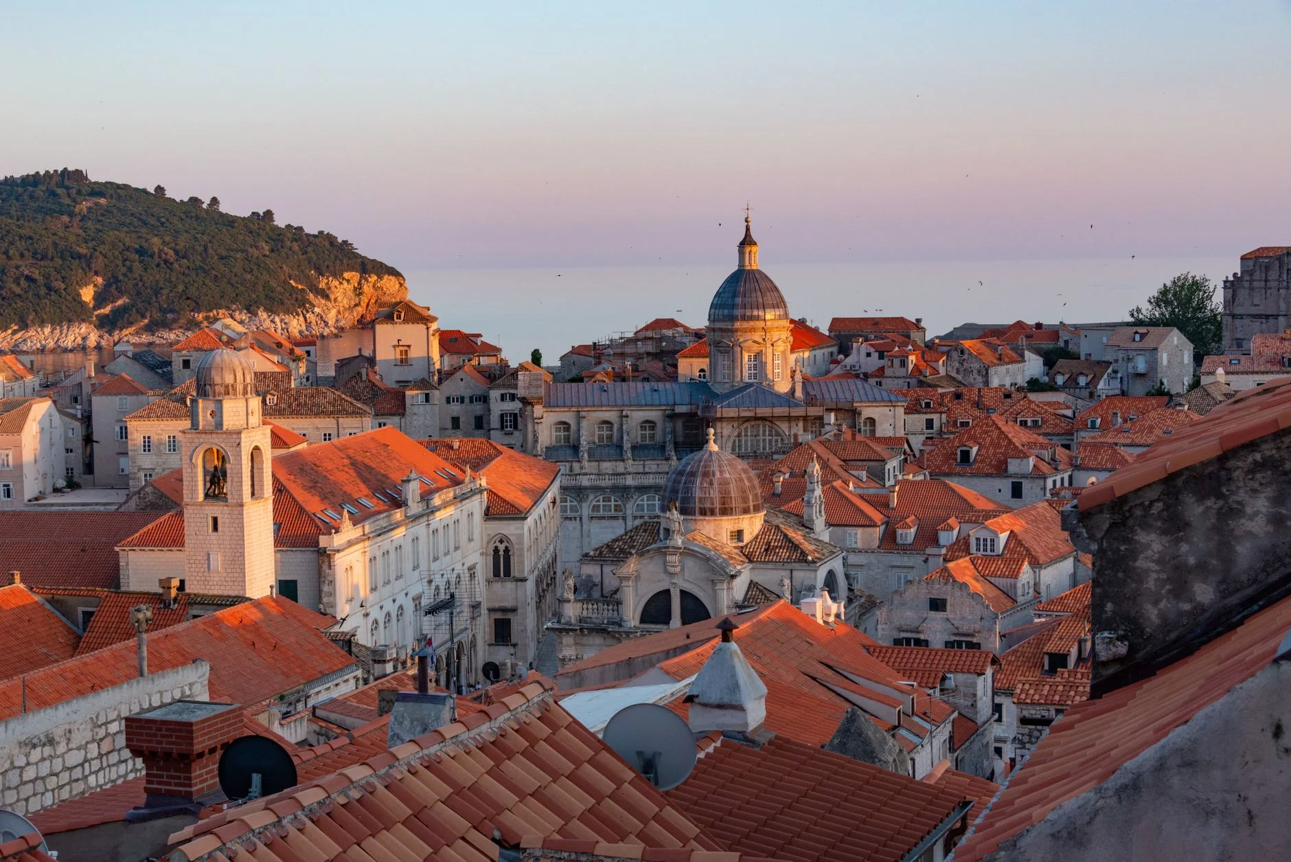 Warm rooftops of Dubrovnik old town beside the Adriatic