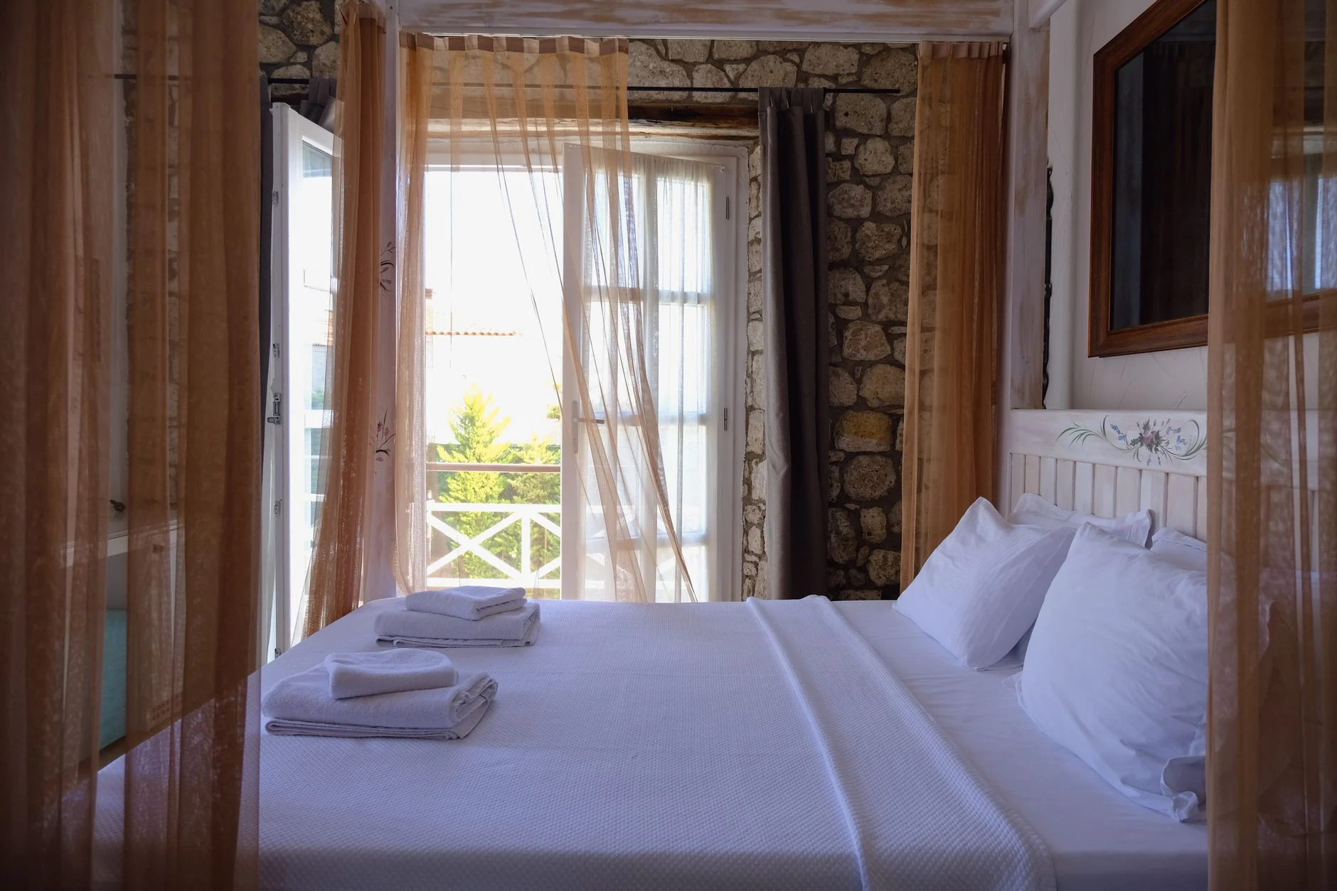 A calm boutique hotel interior with linen and warm natural light